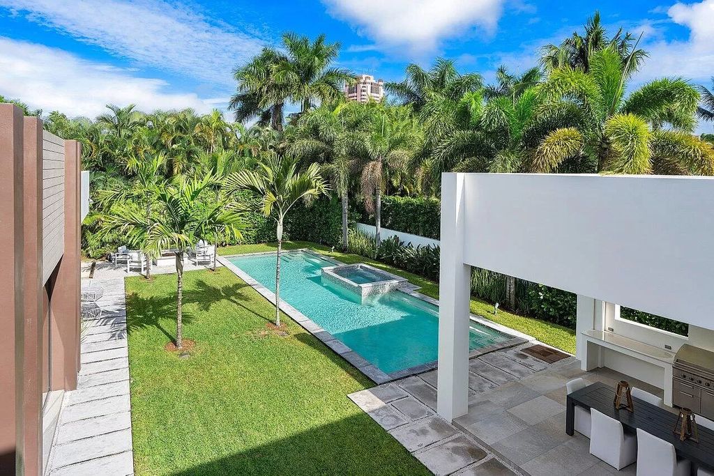 The Home in Boca Raton is a stunning contemporary custom home by award winning Affiniti Architects & CDC Builders now available for sale. This house located at 383 Thatch Palm Dr, Boca Raton, Florida