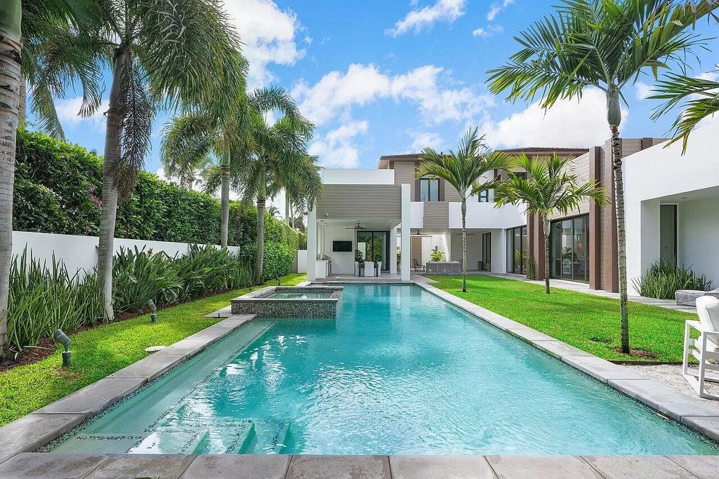 The Home in Boca Raton is a stunning contemporary custom home by award winning Affiniti Architects & CDC Builders now available for sale. This house located at 383 Thatch Palm Dr, Boca Raton, Florida