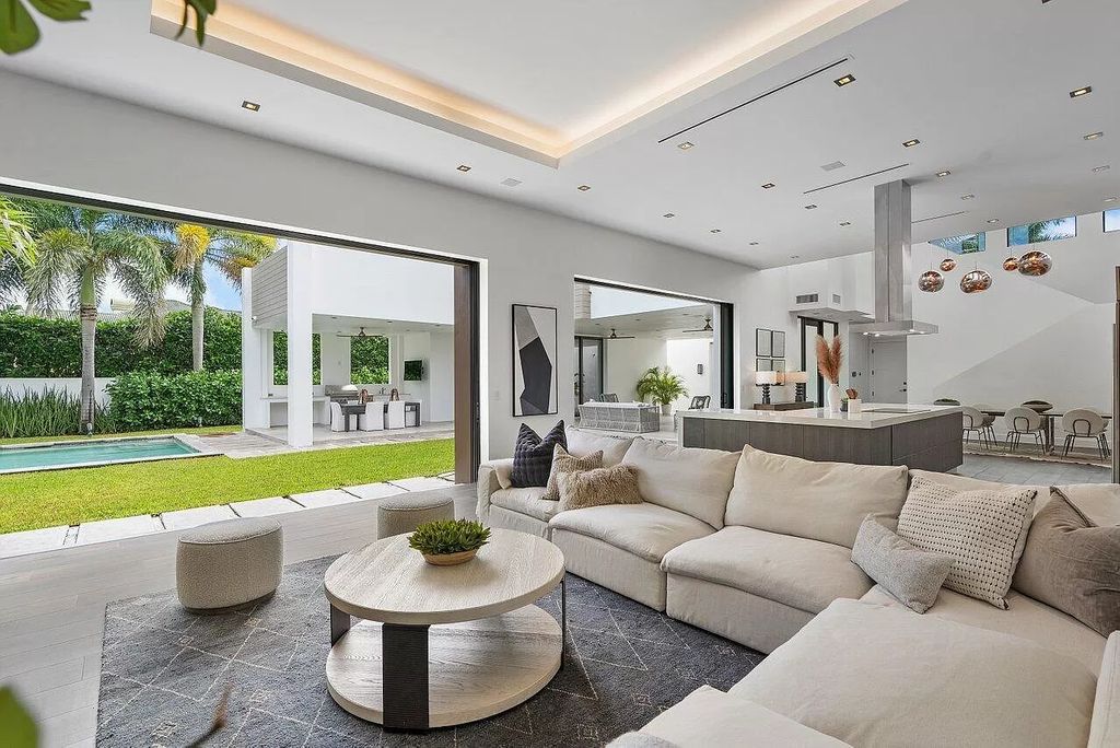 The Home in Boca Raton is a stunning contemporary custom home by award winning Affiniti Architects & CDC Builders now available for sale. This house located at 383 Thatch Palm Dr, Boca Raton, Florida