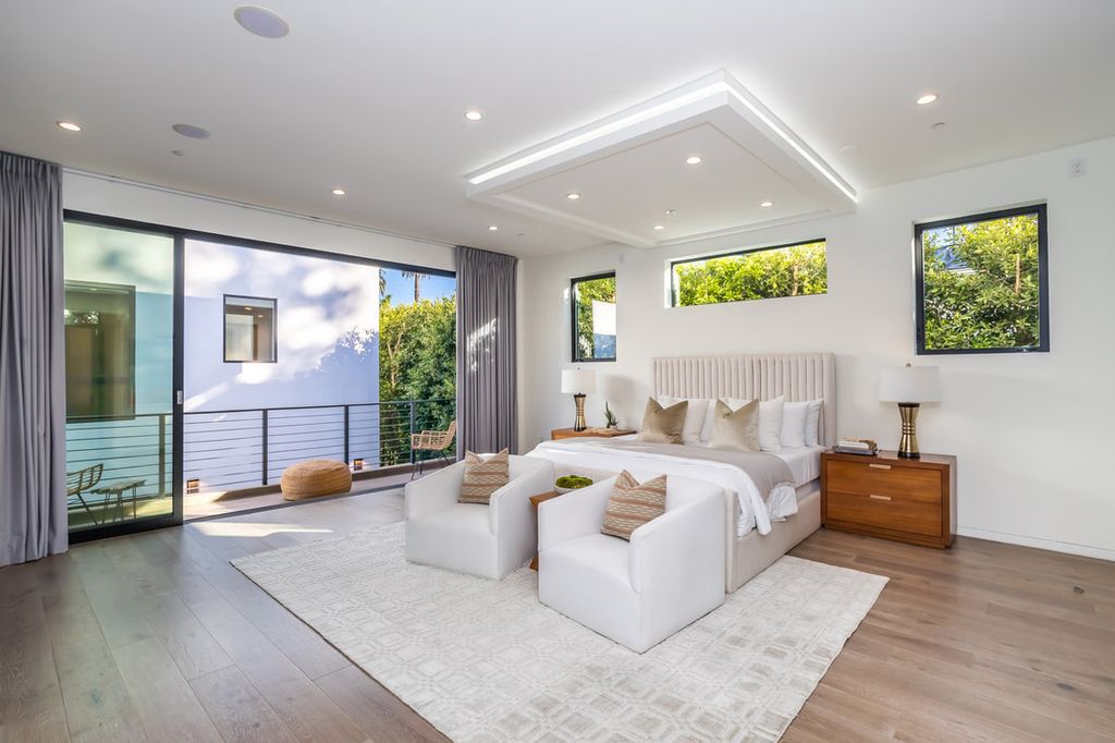 The Home in Los Angeles is a Stunning contemporary home gated for privacy on a prime street in the highly regarded Melrose Village now available for sale. This Estate located at 836 N Ogden Dr, Los Angeles