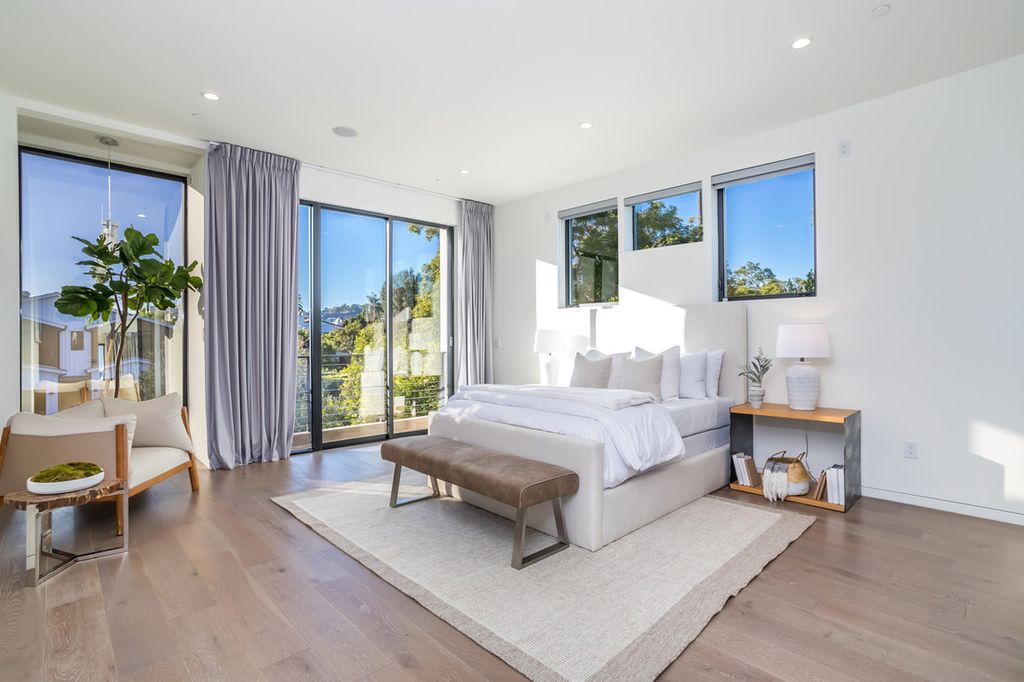 The Home in Los Angeles is a Stunning contemporary home gated for privacy on a prime street in the highly regarded Melrose Village now available for sale. This Estate located at 836 N Ogden Dr, Los Angeles