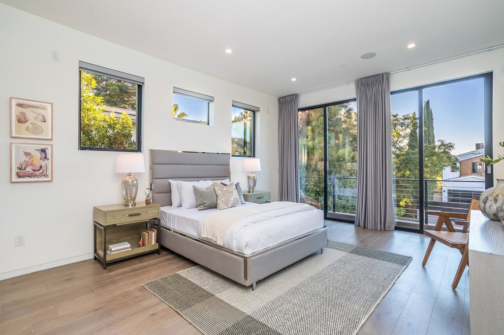 The Home in Los Angeles is a Stunning contemporary home gated for privacy on a prime street in the highly regarded Melrose Village now available for sale. This Estate located at 836 N Ogden Dr, Los Angeles