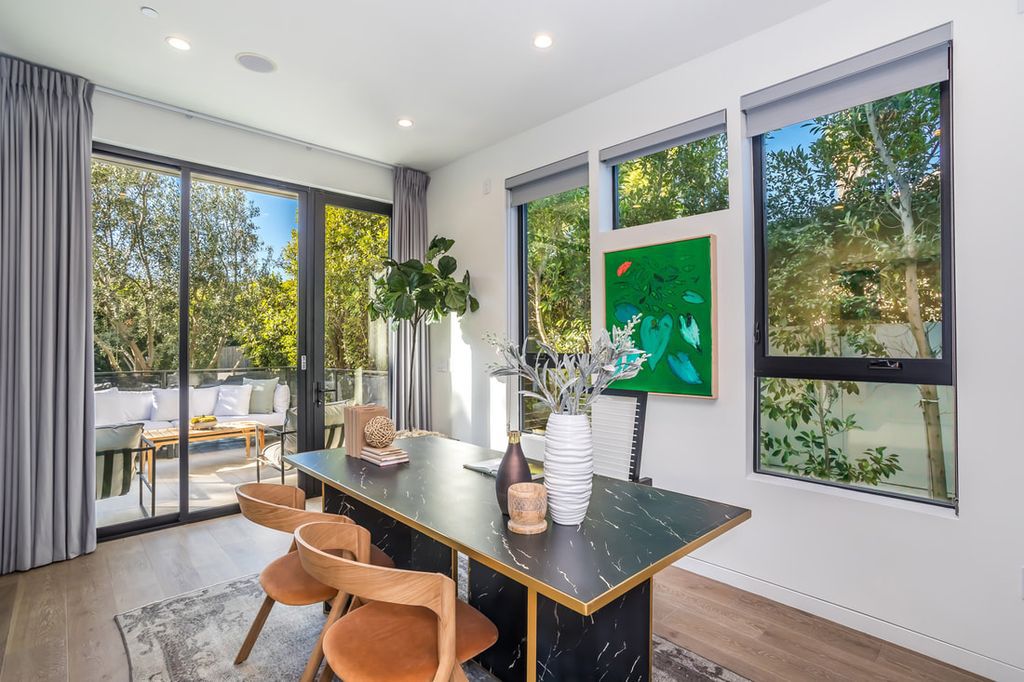 The Home in Los Angeles is a Stunning contemporary home gated for privacy on a prime street in the highly regarded Melrose Village now available for sale. This Estate located at 836 N Ogden Dr, Los Angeles