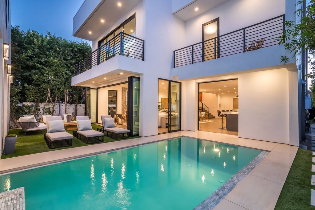 The Home in Los Angeles is a Stunning contemporary home gated for privacy on a prime street in the highly regarded Melrose Village now available for sale. This Estate located at 836 N Ogden Dr, Los Angeles