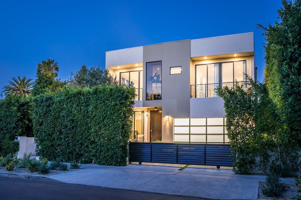 The Home in Los Angeles is a Stunning contemporary home gated for privacy on a prime street in the highly regarded Melrose Village now available for sale. This Estate located at 836 N Ogden Dr, Los Angeles