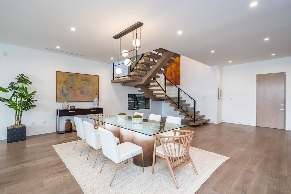 The Home in Los Angeles is a Stunning contemporary home gated for privacy on a prime street in the highly regarded Melrose Village now available for sale. This Estate located at 836 N Ogden Dr, Los Angeles