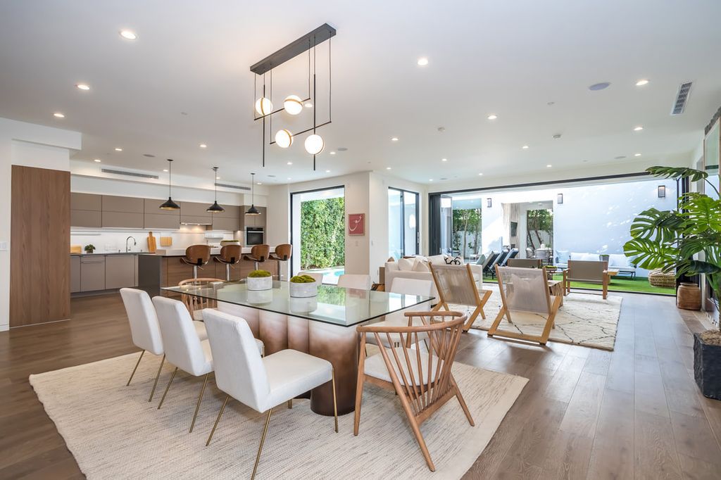 The Home in Los Angeles is a Stunning contemporary home gated for privacy on a prime street in the highly regarded Melrose Village now available for sale. This Estate located at 836 N Ogden Dr, Los Angeles