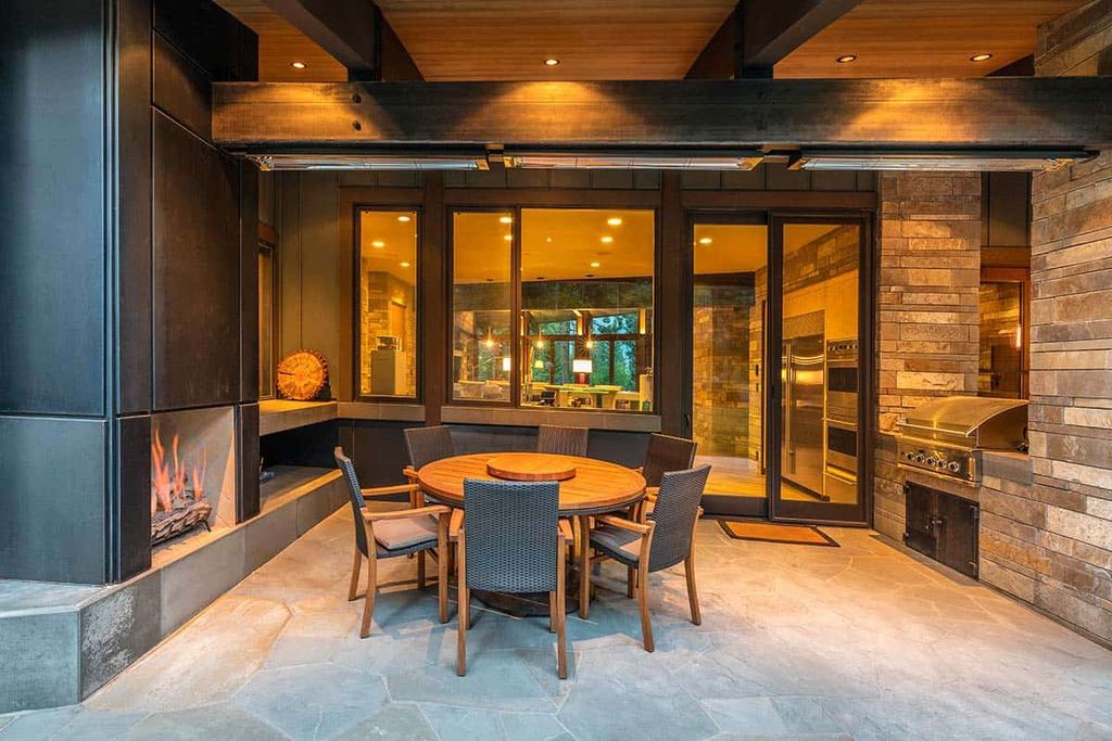 The Martis Camp home is a stunning was designed from a page of the Laws of Mother Nature flows elegantly and naturally now available for sale. This home located at 8209 Valhalla Dr, Truckee, California