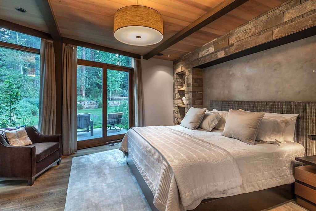 The Martis Camp home is a stunning was designed from a page of the Laws of Mother Nature flows elegantly and naturally now available for sale. This home located at 8209 Valhalla Dr, Truckee, California