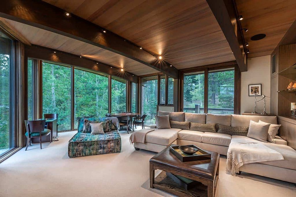 The Martis Camp home is a stunning was designed from a page of the Laws of Mother Nature flows elegantly and naturally now available for sale. This home located at 8209 Valhalla Dr, Truckee, California