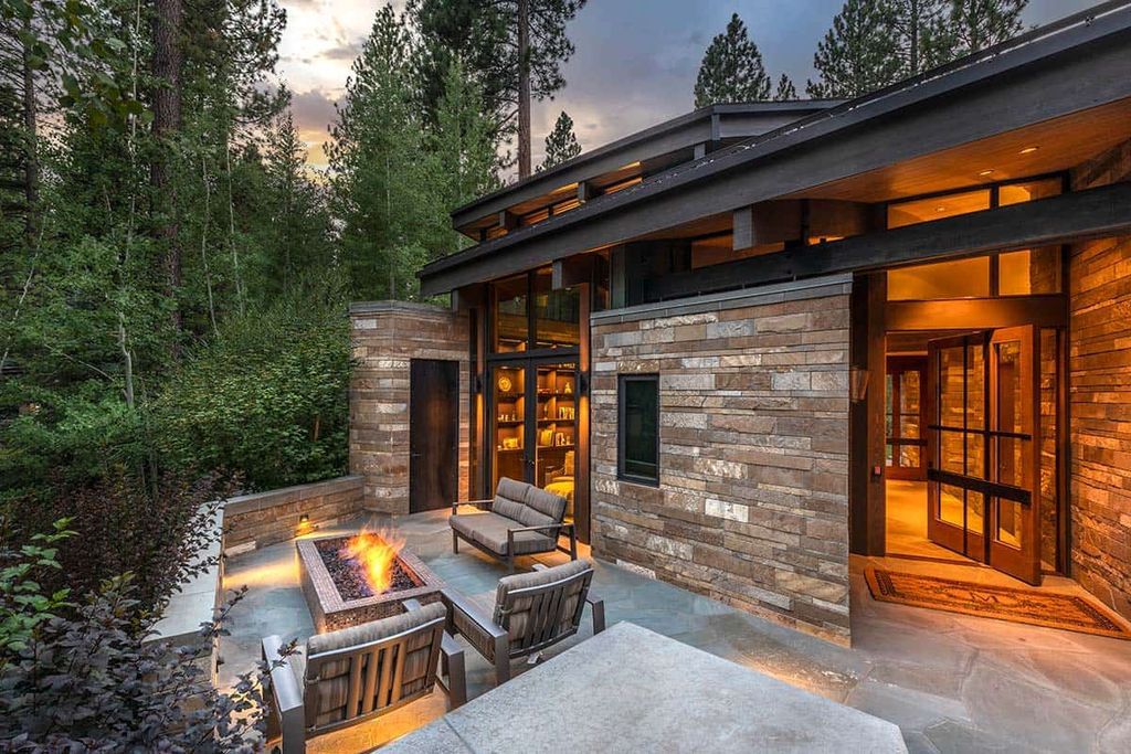 The Martis Camp home is a stunning was designed from a page of the Laws of Mother Nature flows elegantly and naturally now available for sale. This home located at 8209 Valhalla Dr, Truckee, California