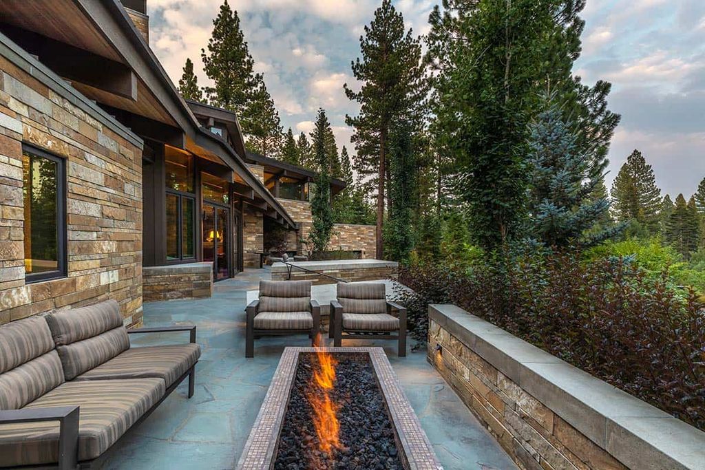 The Martis Camp home is a stunning was designed from a page of the Laws of Mother Nature flows elegantly and naturally now available for sale. This home located at 8209 Valhalla Dr, Truckee, California