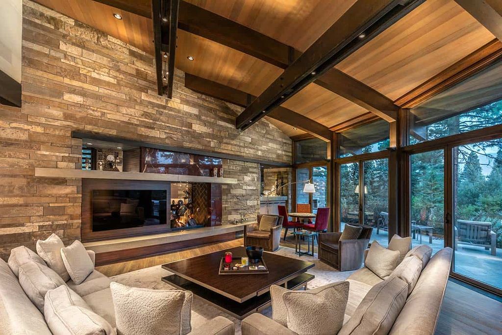 The Martis Camp home is a stunning was designed from a page of the Laws of Mother Nature flows elegantly and naturally now available for sale. This home located at 8209 Valhalla Dr, Truckee, California