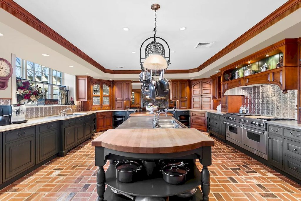 Maximize the functionality and aesthetics of your DIY kitchen by organizing and displaying your pots and pans. Hang them using wall-mounted racks, hooks, or a ceiling-mounted pot rack to save space and keep them within easy reach. This not only frees up cabinet space but also adds a decorative touch to your kitchen. By utilizing this smart storage solution, you can declutter your kitchen efficiently and create a visually appealing and functional cooking area. 