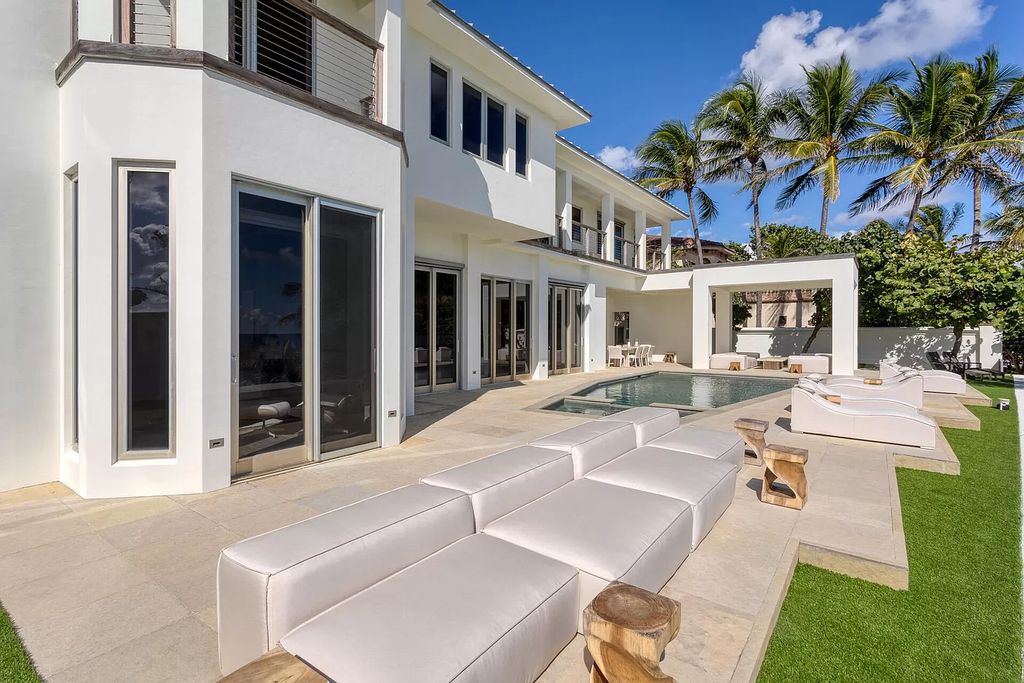 The Home in Delray Beach is sited on lushly landscaped half acre with 110+/- feet directly on the oceanfront now available for sale. This property located at 711 N Ocean Blvd, Delray Beach, Florida
