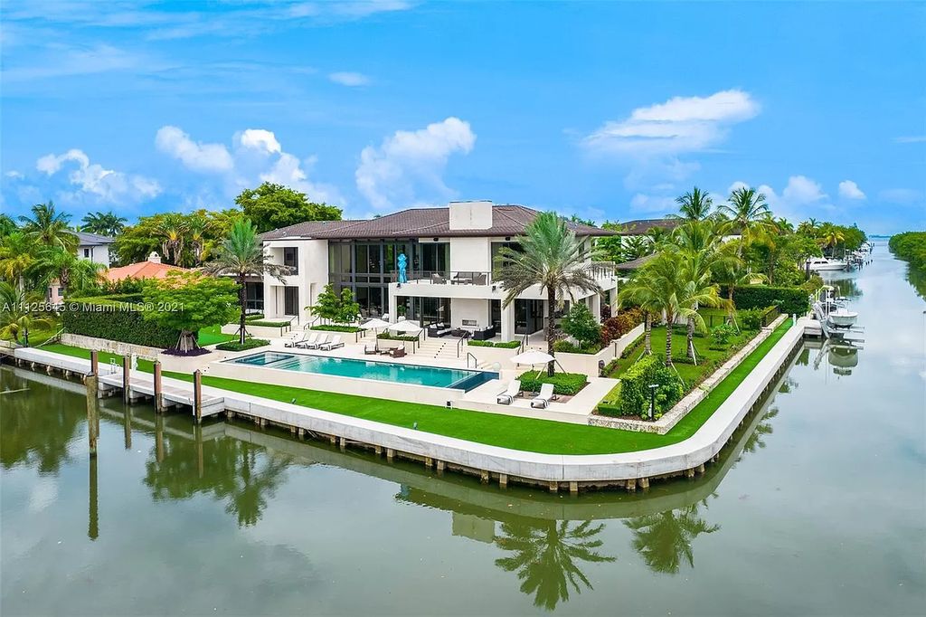 The Miami Home is a dream estate on a corner lot with over 355’ of waterfront in the exclusive gated Community of Old Cutler Bay now available for sale. This home located at 9380 Balada St, Miami, Florida