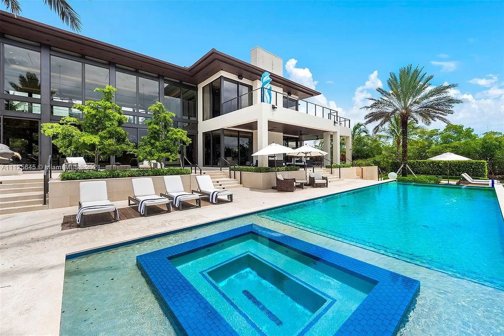The Miami Home is a dream estate on a corner lot with over 355’ of waterfront in the exclusive gated Community of Old Cutler Bay now available for sale. This home located at 9380 Balada St, Miami, Florida