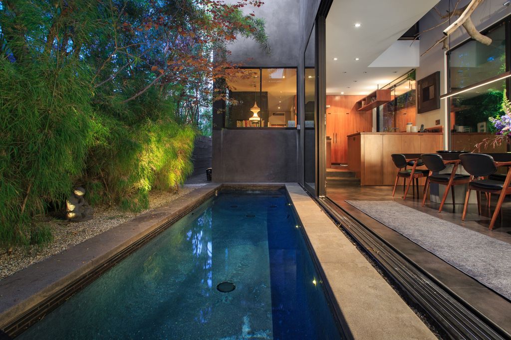 The Home in Venice is a custom-built Marmol Radziner with a pool that infuses cutting-edge style with warmth in an intimate and sultry setting now available for sale. This home located at 730 Palms Blvd, Venice, California