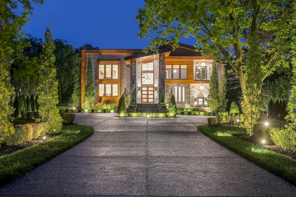 The Tennessee Home is a luxurious home on 2 acres featuring sophisticated lighting, oversized windows and a jaw-dropping pool now available for sale. This home located at 5026 Franklin Pike, Nashville, Tennessee; offering 06 bedrooms and 13 bathrooms with 14,021 square feet of living spaces.