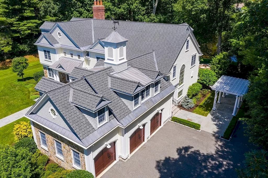 The Home in Massachusetts is a luxurious home now available for sale. This home located at 21 Radcliffe Rd, Weston, Massachusetts; offering 05 bedrooms and 08 bathrooms with 8,475 square feet of living spaces.