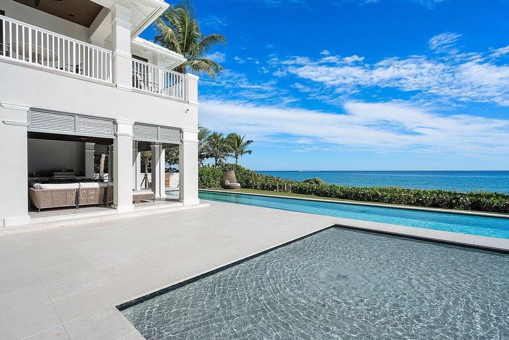 The Home in Gulf Stream is a superb coastal estate with unsurpassed attention to detail and expansive ocean views now available for sale. This home located at 2929 N Ocean Blvd, Gulf Stream, Florida