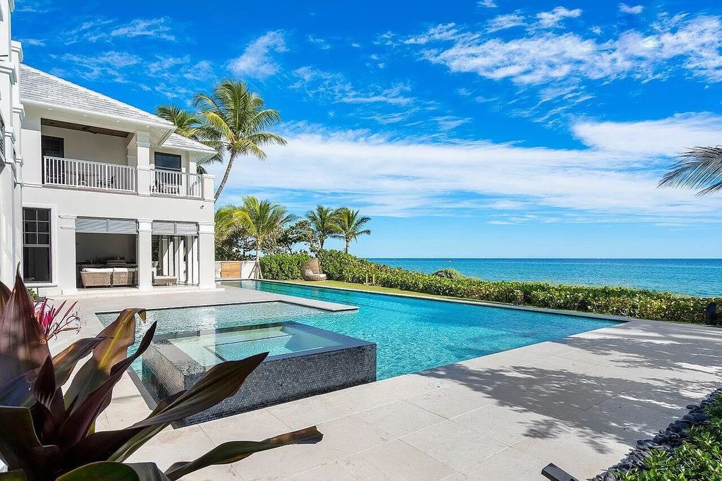 The Home in Gulf Stream is a superb coastal estate with unsurpassed attention to detail and expansive ocean views now available for sale. This home located at 2929 N Ocean Blvd, Gulf Stream, Florida