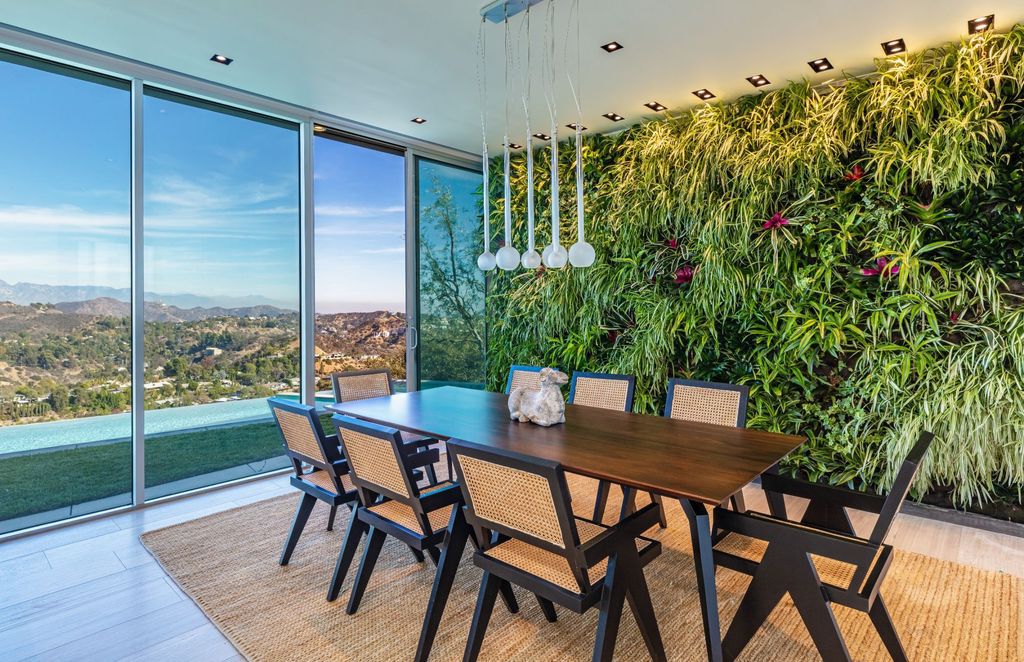 The Los Angeles Home is a hilltop sanctuary nestled on 1.5 picturesque acres perched above Laurel Canyon and built by AIA award-winning architect Hagy Belzberg now available for sale. This home located at 8520 Skyline Dr, Los Angeles, California