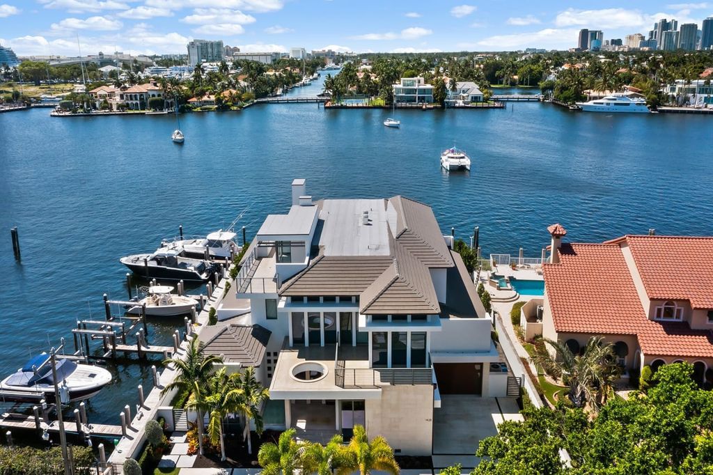 The Home in Fort Lauderdale is a A coastal turn key modern masterpiece in Harbor Beach with entertaining-ready layout now available for sale. This home located at 1425 E Lake Dr, Fort Lauderdale, Florida