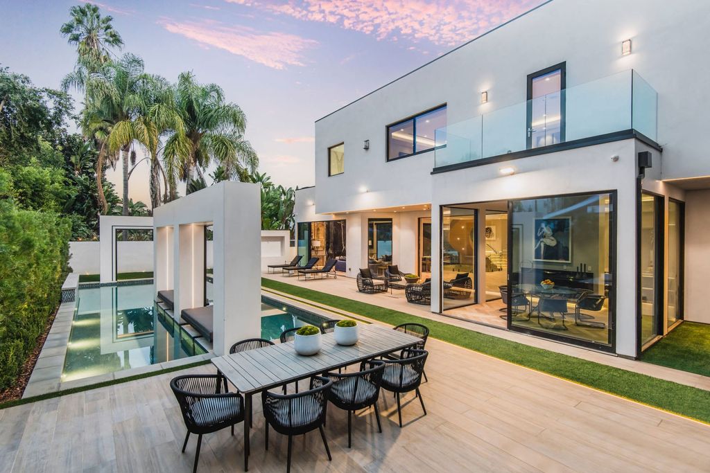 The Home in Beverly Hills is a contemporary new-build, designed by Gabbay Architects is sited behind mature olive trees now available for sale. This home located at 1729 Angelo Dr, Beverly Hills, California