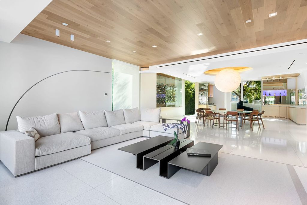 The Home in Fort Lauderdale is a Sophisticated & sleek mid-century modern inspired home located in Seven Isles now available for sale. This house located at 2409 Desota Dr, Fort Lauderdale, Florida