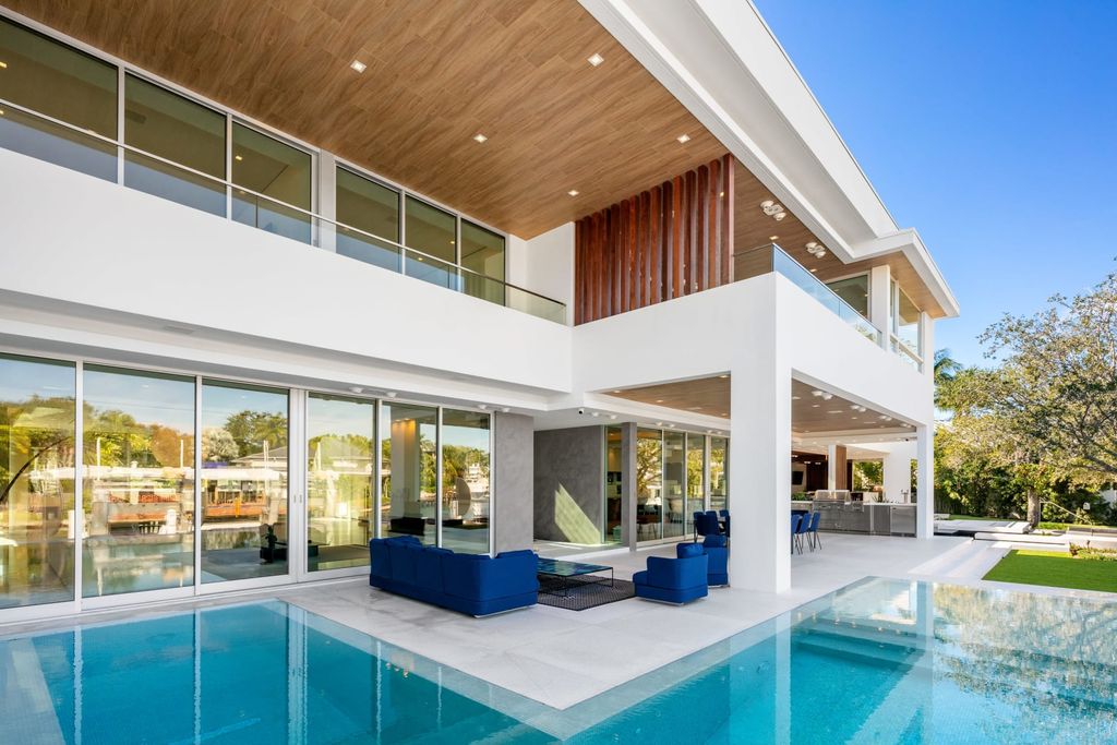 The Home in Fort Lauderdale is a Sophisticated & sleek mid-century modern inspired home located in Seven Isles now available for sale. This house located at 2409 Desota Dr, Fort Lauderdale, Florida