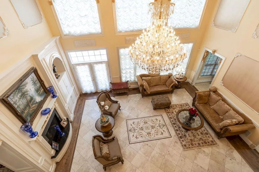 The Home in Virginia is an opulent four-floor home, fully fenced, and equipped with smart technology now available for sale. This home located at 12792 Yates Ford Rd, Clifton, Virginia; offering 07 bedrooms and 13 bathrooms with 16,600 square feet of living spaces. 