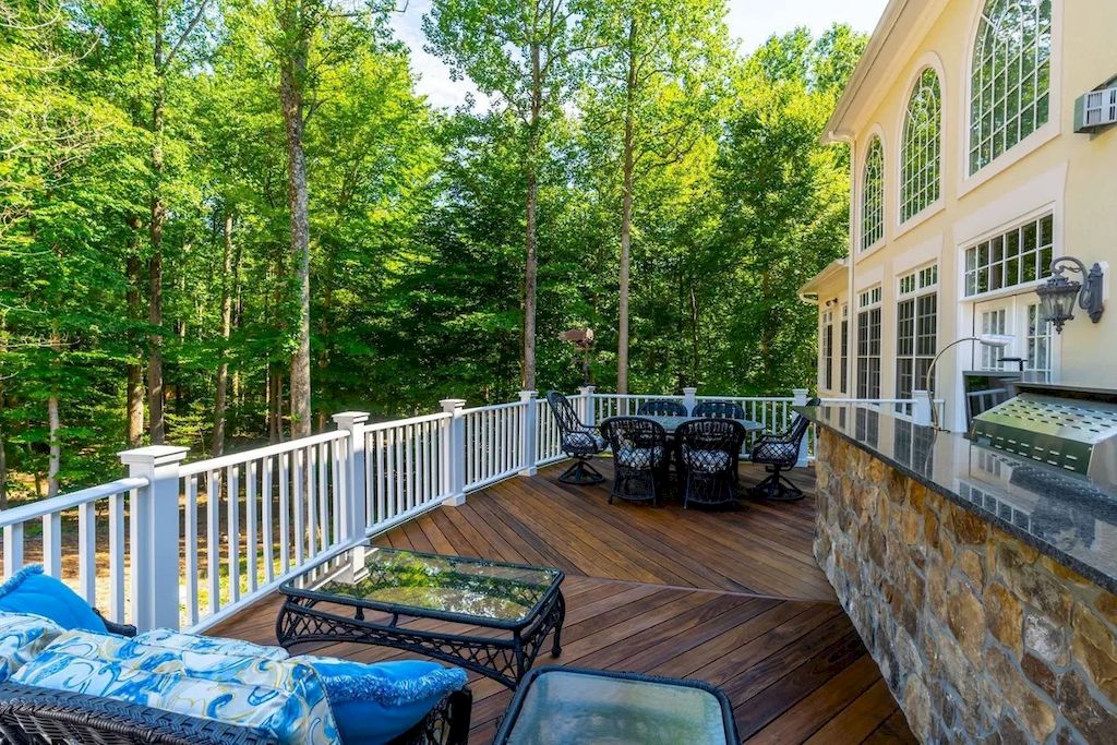 The Home in Virginia is an opulent four-floor home, fully fenced, and equipped with smart technology now available for sale. This home located at 12792 Yates Ford Rd, Clifton, Virginia; offering 07 bedrooms and 13 bathrooms with 16,600 square feet of living spaces. 