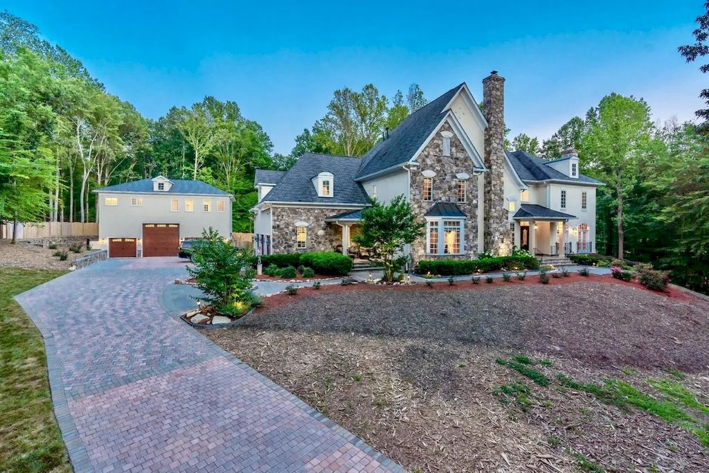 The Home in Virginia is an opulent four-floor home, fully fenced, and equipped with smart technology now available for sale. This home located at 12792 Yates Ford Rd, Clifton, Virginia; offering 07 bedrooms and 13 bathrooms with 16,600 square feet of living spaces. 