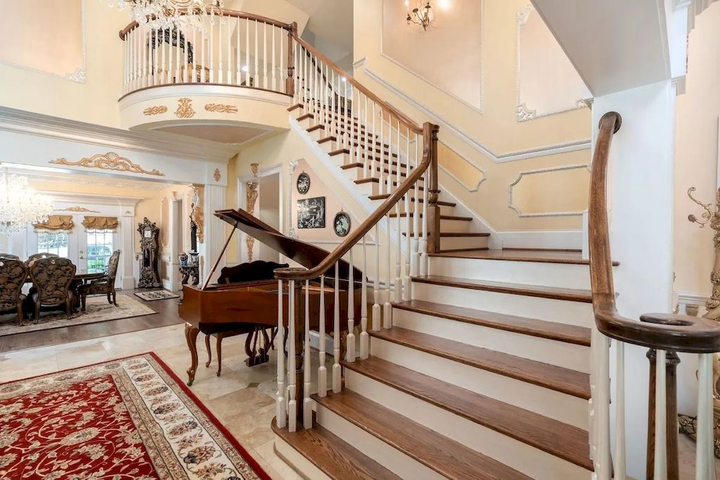 The Home in Virginia is an opulent four-floor home, fully fenced, and equipped with smart technology now available for sale. This home located at 12792 Yates Ford Rd, Clifton, Virginia; offering 07 bedrooms and 13 bathrooms with 16,600 square feet of living spaces. 
