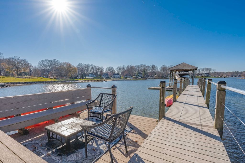 The Home in North Carolina is a luxurious home capturing magnificent views of Lake Norman now available for sale. This home located at 8343 Norman Estates Dr, Denver, North Carolina; offering 05 bedrooms and 07 bathrooms with 8,094 square feet of living spaces. 