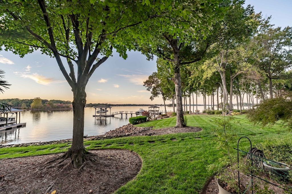 The Home in North Carolina is a luxurious home capturing magnificent views of Lake Norman now available for sale. This home located at 8343 Norman Estates Dr, Denver, North Carolina; offering 05 bedrooms and 07 bathrooms with 8,094 square feet of living spaces. 