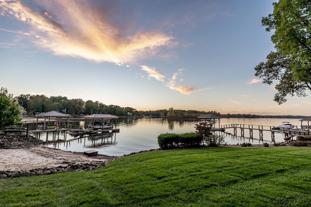 The Home in North Carolina is a luxurious home capturing magnificent views of Lake Norman now available for sale. This home located at 8343 Norman Estates Dr, Denver, North Carolina; offering 05 bedrooms and 07 bathrooms with 8,094 square feet of living spaces. 