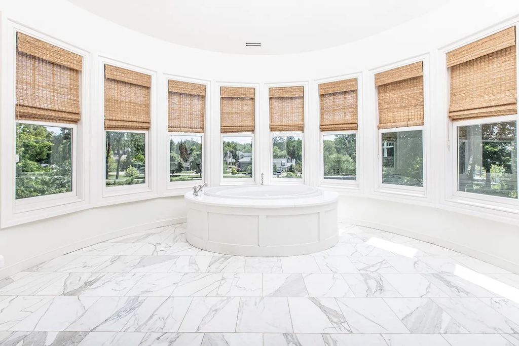 The Home in Michigan is a luxurious home with panoramic views of renowned Quarton Lake now available for sale. This home located at 220 Lake Park Dr, Birmingham, Michigan; offering 05 bedrooms and 07 bathrooms with 13,012 square feet of living spaces.