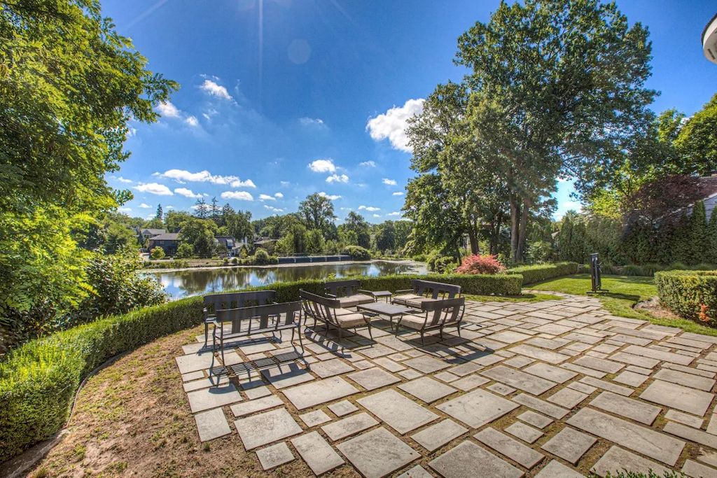 The Home in Michigan is a luxurious home with panoramic views of renowned Quarton Lake now available for sale. This home located at 220 Lake Park Dr, Birmingham, Michigan; offering 05 bedrooms and 07 bathrooms with 13,012 square feet of living spaces.