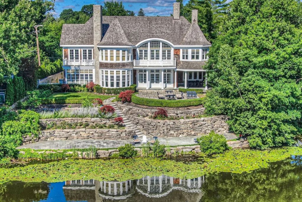 The Home in Michigan is a luxurious home with panoramic views of renowned Quarton Lake now available for sale. This home located at 220 Lake Park Dr, Birmingham, Michigan; offering 05 bedrooms and 07 bathrooms with 13,012 square feet of living spaces.