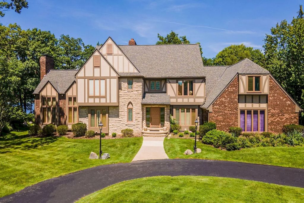 The Home in Michigan is a luxurious home with incredible lake views now available for sale. This home located at 5430 Pontiac Trl, Orchard Lake, Michigan; offering 05 bedrooms and 07 bathrooms with 10,920 square feet of living spaces.
