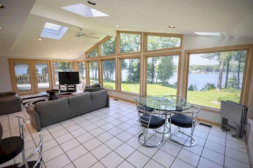 The Home in Michigan is a luxurious home with incredible lake views now available for sale. This home located at 5430 Pontiac Trl, Orchard Lake, Michigan; offering 05 bedrooms and 07 bathrooms with 10,920 square feet of living spaces.