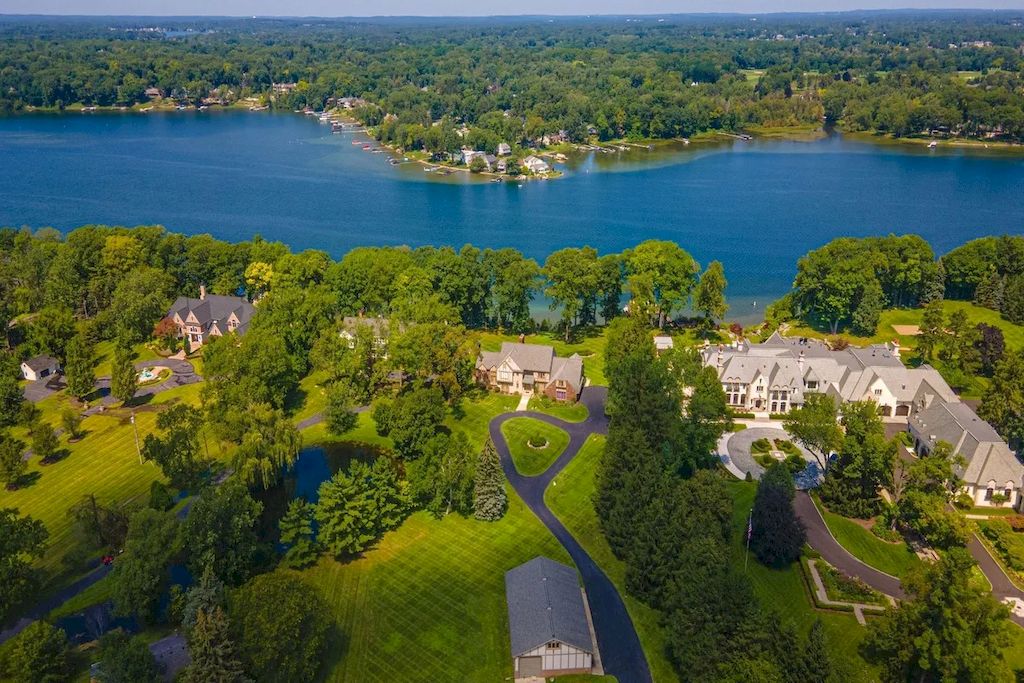 The Home in Michigan is a luxurious home with incredible lake views now available for sale. This home located at 5430 Pontiac Trl, Orchard Lake, Michigan; offering 05 bedrooms and 07 bathrooms with 10,920 square feet of living spaces.