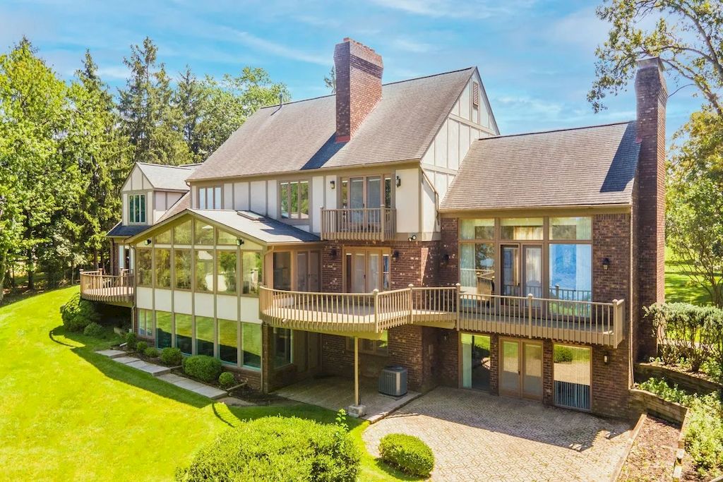 The Home in Michigan is a luxurious home with incredible lake views now available for sale. This home located at 5430 Pontiac Trl, Orchard Lake, Michigan; offering 05 bedrooms and 07 bathrooms with 10,920 square feet of living spaces.