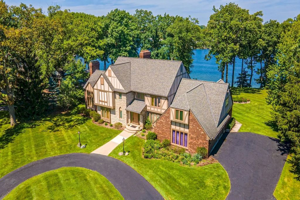 The Home in Michigan is a luxurious home with incredible lake views now available for sale. This home located at 5430 Pontiac Trl, Orchard Lake, Michigan; offering 05 bedrooms and 07 bathrooms with 10,920 square feet of living spaces.