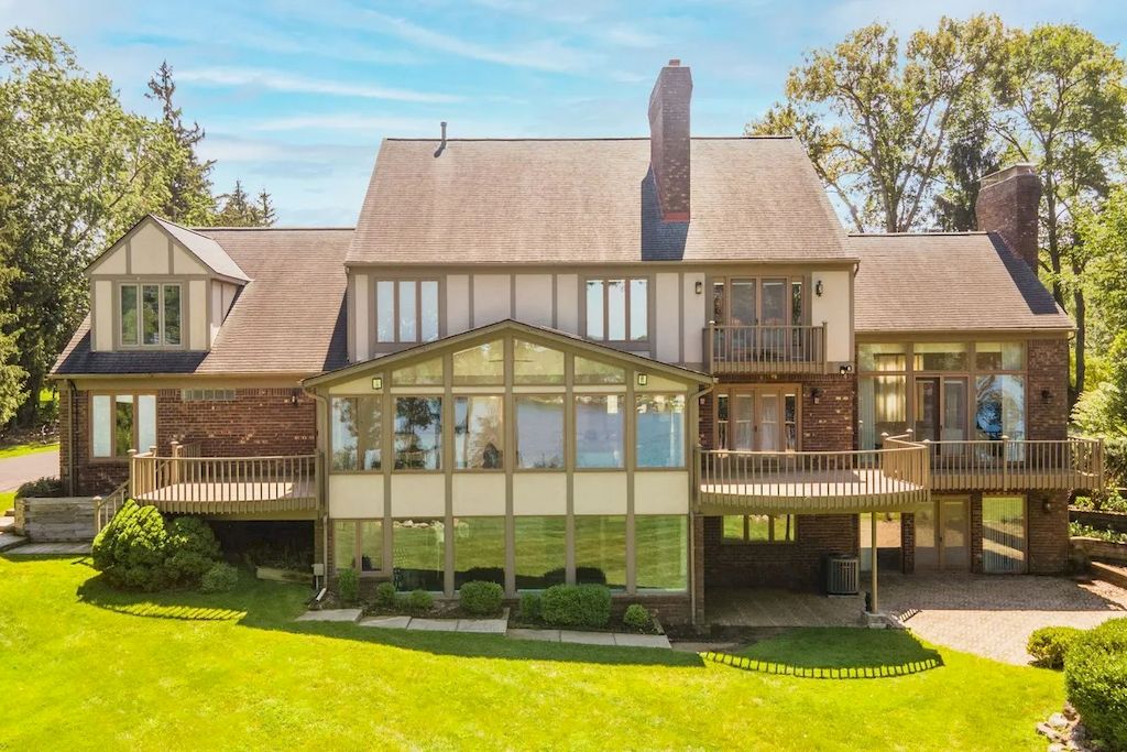 The Home in Michigan is a luxurious home with incredible lake views now available for sale. This home located at 5430 Pontiac Trl, Orchard Lake, Michigan; offering 05 bedrooms and 07 bathrooms with 10,920 square feet of living spaces.