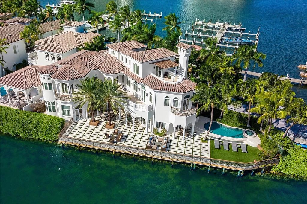 The Miami Beach Home is a unique tri-level estates sits along 251 feet of wide bay views and has 2 deeded docks now available for sale. This house located at 042 Island Estates Dr, North Miami Beach, Florida