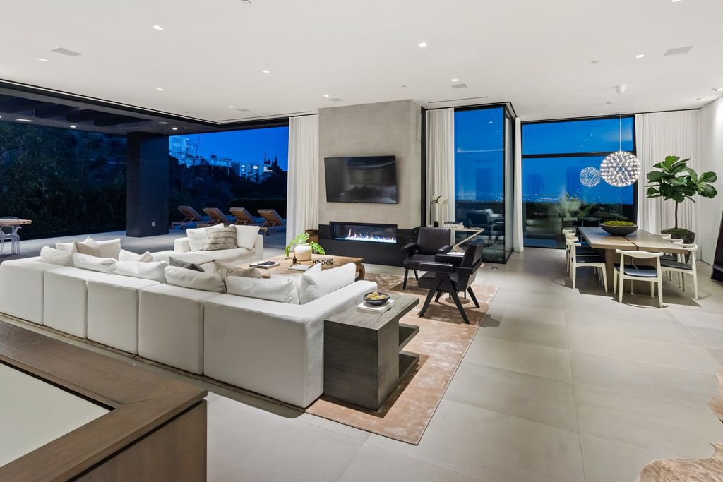 The Home in Los Angeles is a Doheny Estates architectural masterpiece enjoys captivating city and ocean views now available for sale. This house located at 1814 Marcheeta Pl, Los Angeles, California