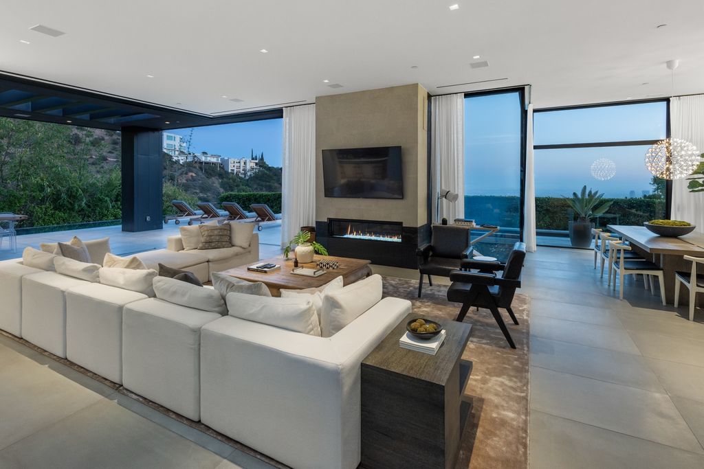 The Home in Los Angeles is a Doheny Estates architectural masterpiece enjoys captivating city and ocean views now available for sale. This house located at 1814 Marcheeta Pl, Los Angeles, California